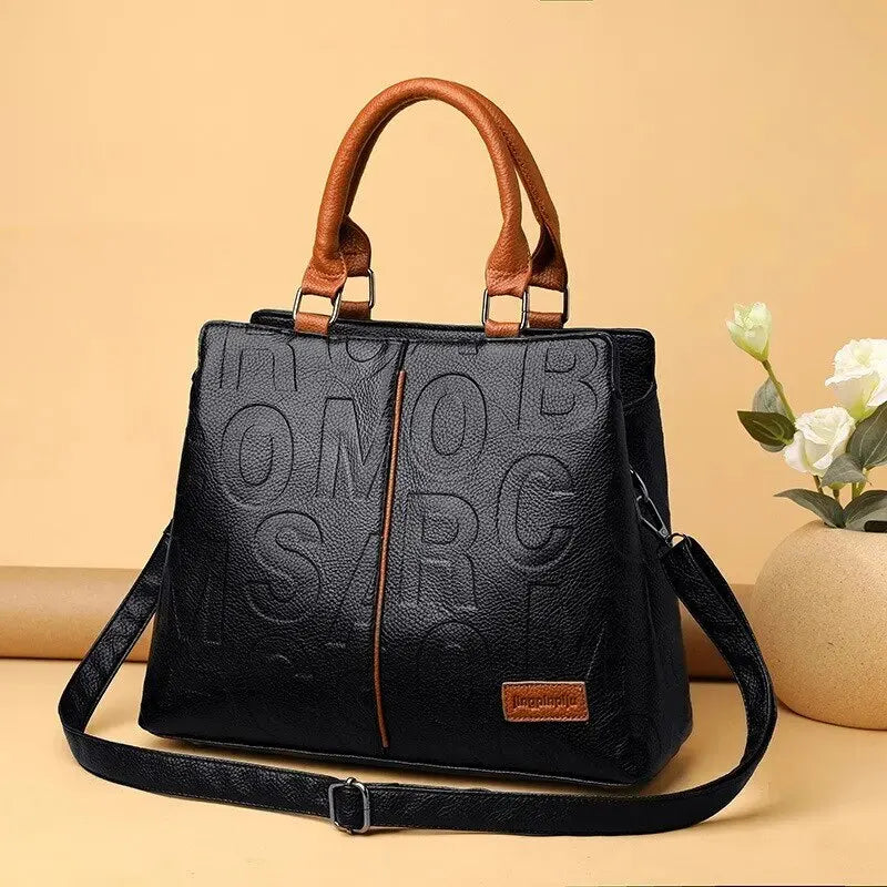 2024 Fashion Statement: Solid Color Shoulder Bag with Large Capacity, Soft Leather, and Letter Embossed Design for Ladies