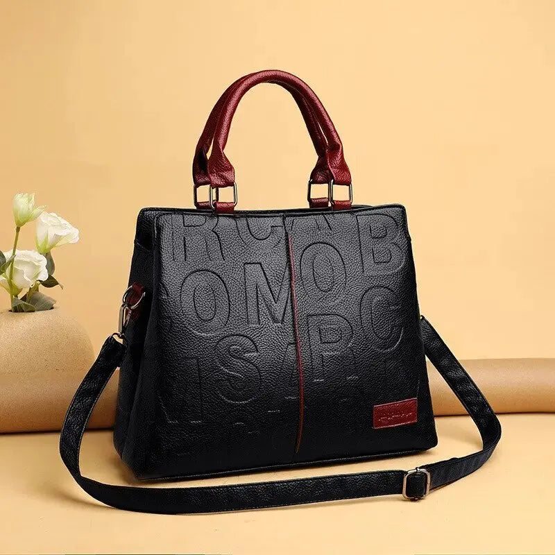 2024 Fashion Statement: Solid Color Shoulder Bag with Large Capacity, Soft Leather, and Letter Embossed Design for Ladies